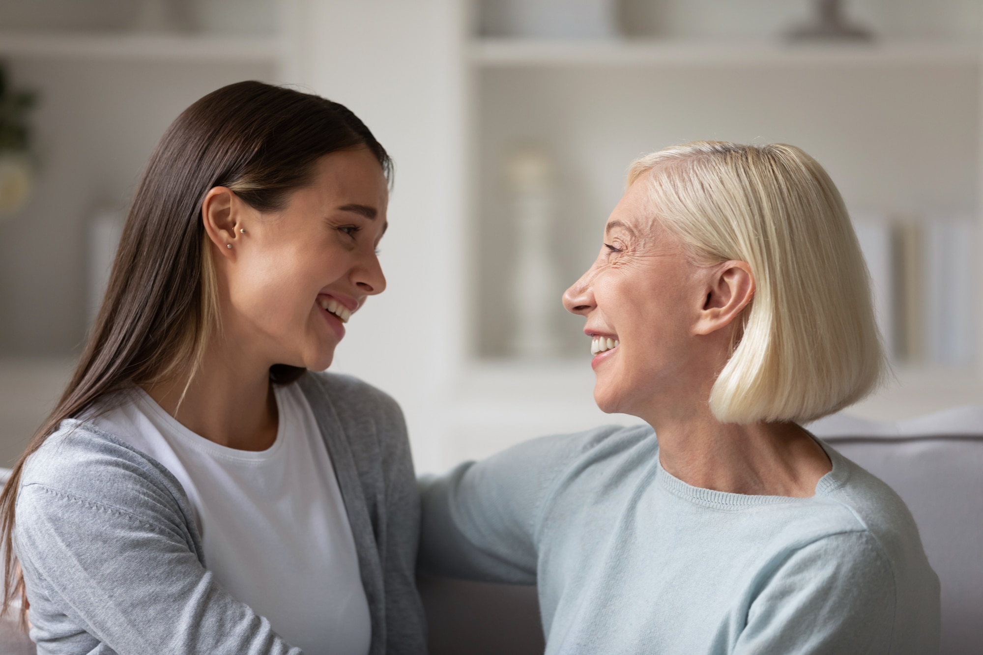 Woman showing respect to her aging mom